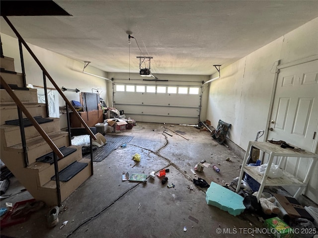 10653 E 18th St, Tulsa, OK 74128 - garage featuring a garage door opener