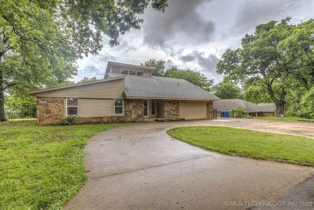 8424 Harp Blvd, Broken Arrow, OK 74014 - mid-century inspired home with stone siding, driveway, a garage, and a front yard