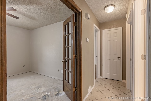 8424 Harp Blvd, Broken Arrow, OK 74014 - corridor featuring a textured ceiling