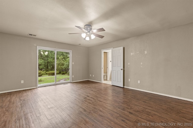 8424 Harp Blvd, Broken Arrow, OK 74014 - empty room featuring a ceiling fan, wood finished floors, and baseboards
