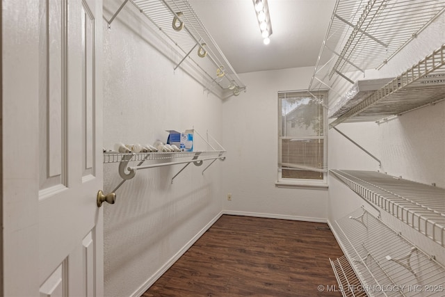 8424 Harp Blvd, Broken Arrow, OK 74014 - walk in closet featuring wood finished floors