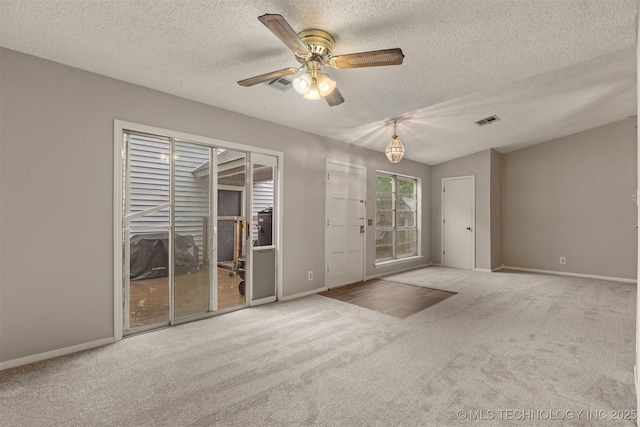 4012 S Cedar Ave, Broken Arrow, OK 74011 - empty room featuring carpet flooring, a textured ceiling, baseboards, and ceiling fan