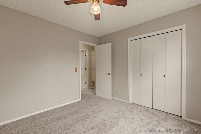 4012 S Cedar Ave, Broken Arrow, OK 74011 - unfurnished bedroom featuring carpet, a closet, baseboards, and ceiling fan