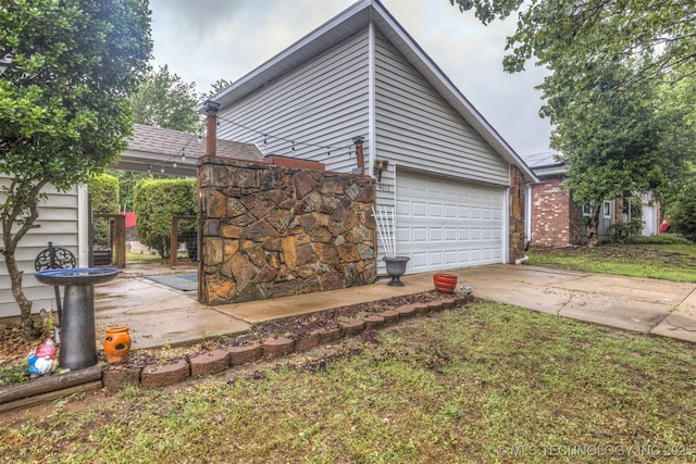 4012 S Cedar Ave, Broken Arrow, OK 74011 - view of property exterior with a garage and driveway
