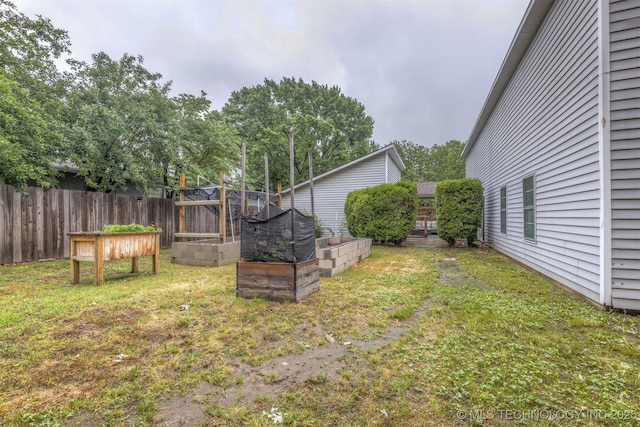 4012 S Cedar Ave, Broken Arrow, OK 74011 - view of yard featuring a vegetable garden