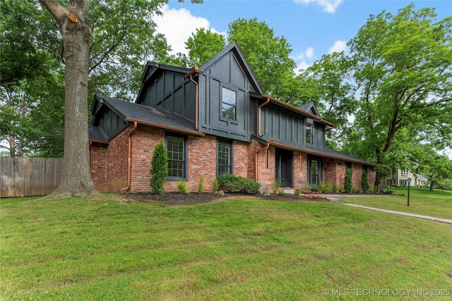 7802 S Joplin Ave, Tulsa, OK 74136 - tudor house featuring brick siding and board and batten siding