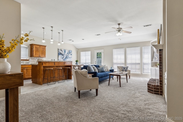 12326 S Cedar Ave, Jenks, OK 74037 - living area with ceiling fan, light colored carpet, and lofted ceiling