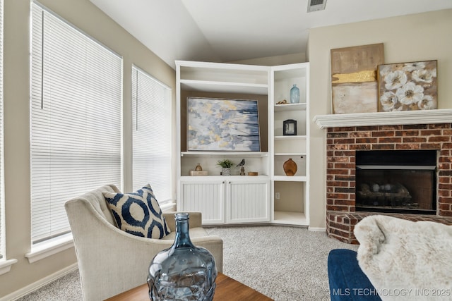 12326 S Cedar Ave, Jenks, OK 74037 - living area with a fireplace, baseboards, and wood finished floors