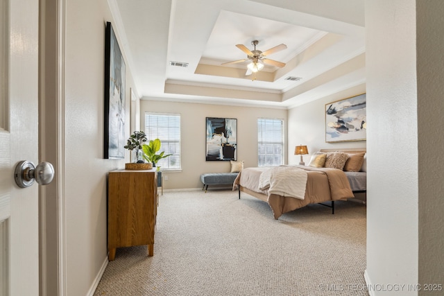 12326 S Cedar Ave, Jenks, OK 74037 - bedroom with carpet floors, ornamental molding, a tray ceiling, baseboards, and ceiling fan