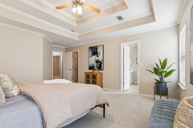 12326 S Cedar Ave, Jenks, OK 74037 - bedroom featuring a raised ceiling, crown molding, light colored carpet, baseboards, and ensuite bathroom