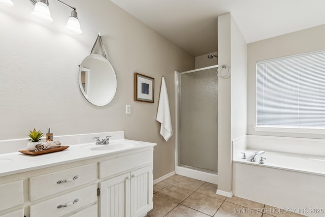 12326 S Cedar Ave, Jenks, OK 74037 - bathroom with a shower stall, tile patterned floors, a bath, vanity, and baseboards