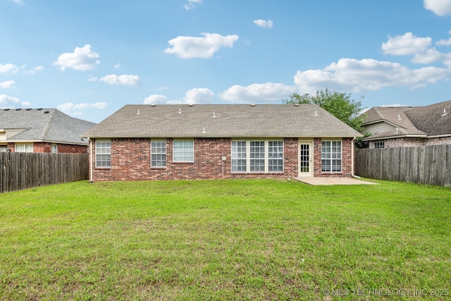 12326 S Cedar Ave, Jenks, OK 74037 - back of property with a patio area, brick siding, and roof with shingles