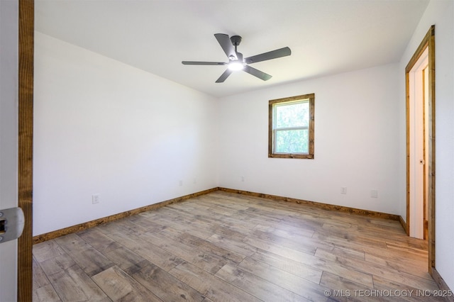 984 Ridgepoint, Fort Towson, OK 74735 - unfurnished bedroom featuring wood finished floors, baseboards, and ceiling fan