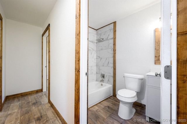 984 Ridgepoint, Fort Towson, OK 74735 - bathroom featuring vanity, toilet, wood finished floors, and shower / tub combination