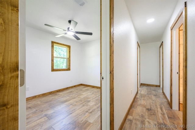 984 Ridgepoint, Fort Towson, OK 74735 - corridor featuring light wood-style floors, baseboards, and recessed lighting