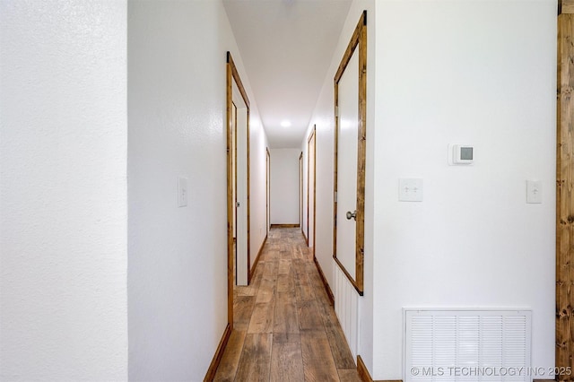 984 Ridgepoint, Fort Towson, OK 74735 - hall featuring hardwood / wood-style flooring, baseboards, and recessed lighting