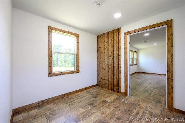 984 Ridgepoint, Fort Towson, OK 74735 - unfurnished room with wood finished floors, recessed lighting, and baseboards