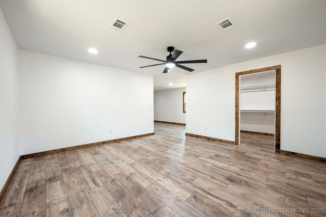 984 Ridgepoint, Fort Towson, OK 74735 - unfurnished room with ceiling fan, wood finished floors, baseboards, and recessed lighting
