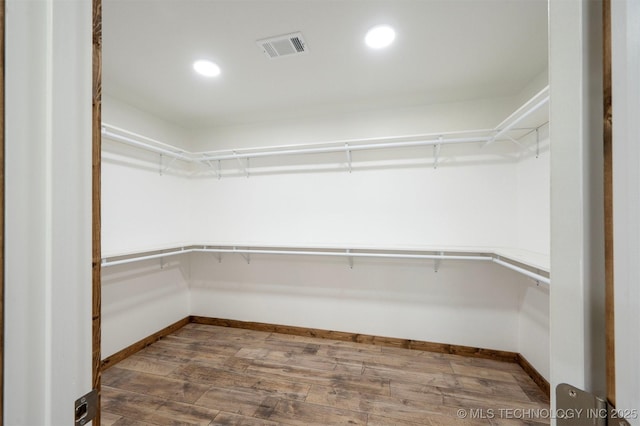 984 Ridgepoint, Fort Towson, OK 74735 - spacious closet featuring dark wood finished floors