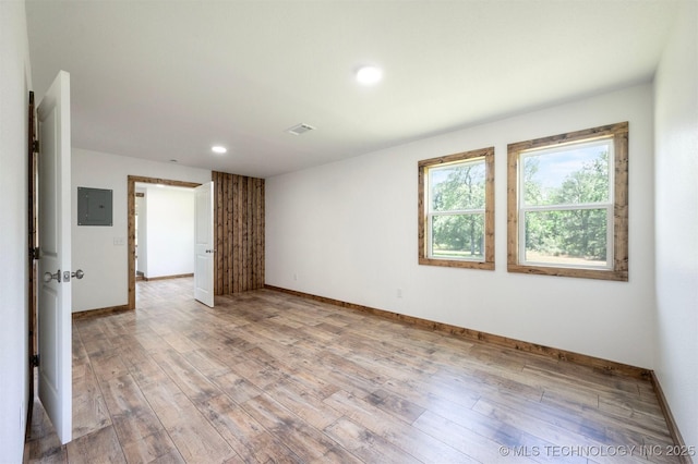 984 Ridgepoint, Fort Towson, OK 74735 - spare room with electric panel, light wood-style flooring, baseboards, and recessed lighting