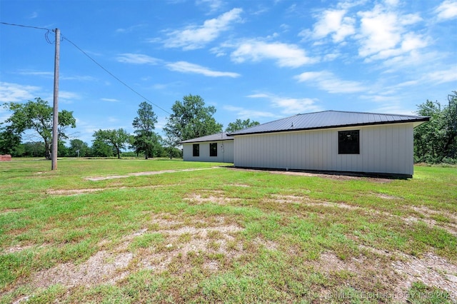 984 Ridgepoint, Fort Towson, OK 74735 - view of grassy yard featuring an outbuilding