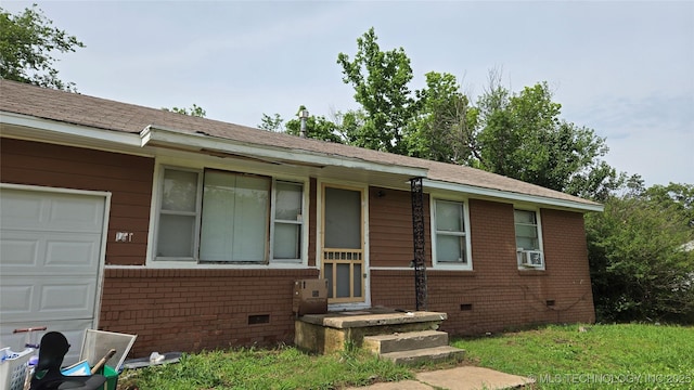 161 W 49th Pl N, Tulsa, OK 74126 - view of front of property with brick siding, crawl space, and a garage