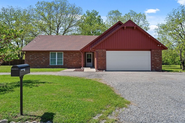1510 Bowden Pl, Fort Gibson, OK 74434 - ranch-style home with board and batten siding, brick siding, and driveway