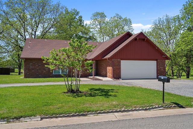 1510 Bowden Pl, Fort Gibson, OK 74434 - view of front of house with driveway, brick siding, a front lawn, and a garage