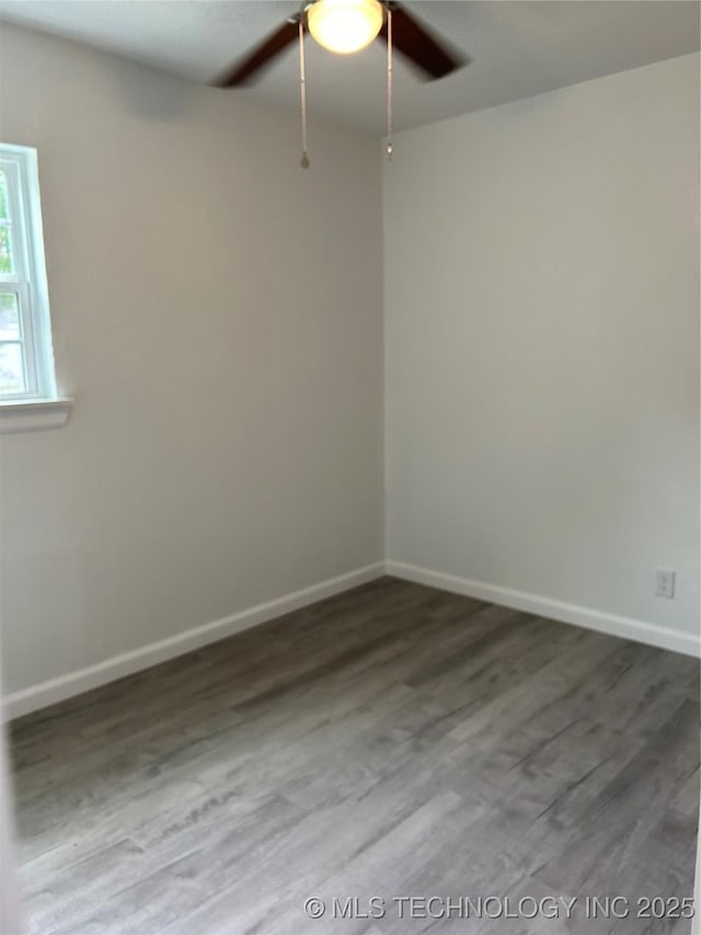 4613 N Main St E, Tulsa, OK 74115 - empty room with ceiling fan, wood finished floors, and baseboards