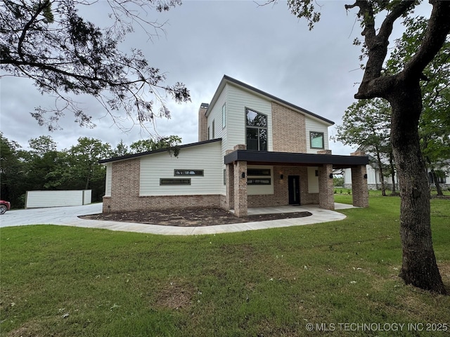 659 Sleepy Hollow Ln, Cleveland, OK 74020 - contemporary home with brick siding, a front lawn, and a chimney