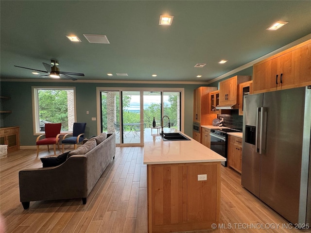 659 Sleepy Hollow Ln, Cleveland, OK 74020 - kitchen with stainless steel refrigerator with ice dispenser, a sink, electric stove, crown molding, and open floor plan