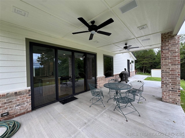 659 Sleepy Hollow Ln, Cleveland, OK 74020 - view of patio featuring a ceiling fan and outdoor dining space