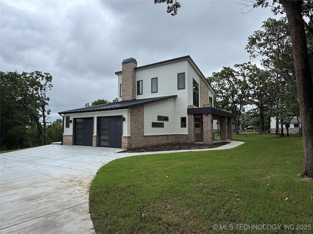 659 Sleepy Hollow Ln, Cleveland, OK 74020 - view of side of property with driveway, a chimney, a lawn, brick siding, and an attached garage