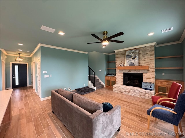 659 Sleepy Hollow Ln, Cleveland, OK 74020 - living room with ornamental molding, wood tiled floors, ceiling fan, recessed lighting, and baseboards