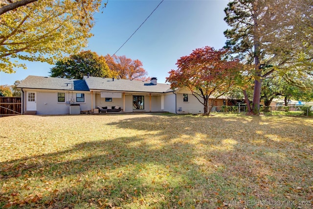 5132 S Atlanta Ave, Tulsa, OK 74105 - back of house featuring a chimney and cooling unit