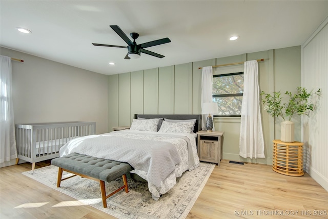 5132 S Atlanta Ave, Tulsa, OK 74105 - bedroom with wood finished floors, a ceiling fan, recessed lighting, and baseboards