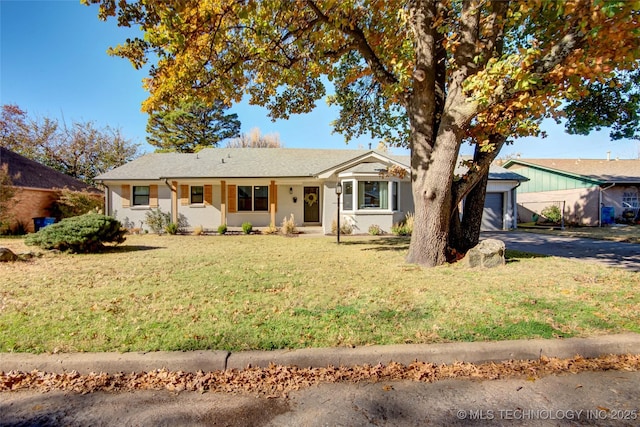 5132 S Atlanta Ave, Tulsa, OK 74105 - ranch-style house with driveway and a front yard