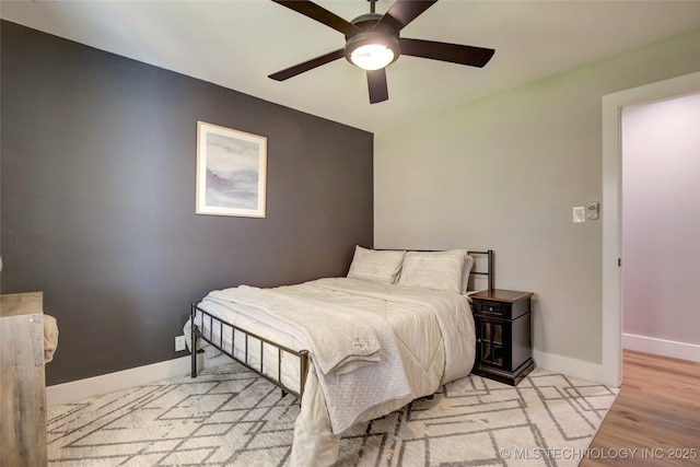 5132 S Atlanta Ave, Tulsa, OK 74105 - bedroom featuring baseboards, light wood finished floors, and ceiling fan