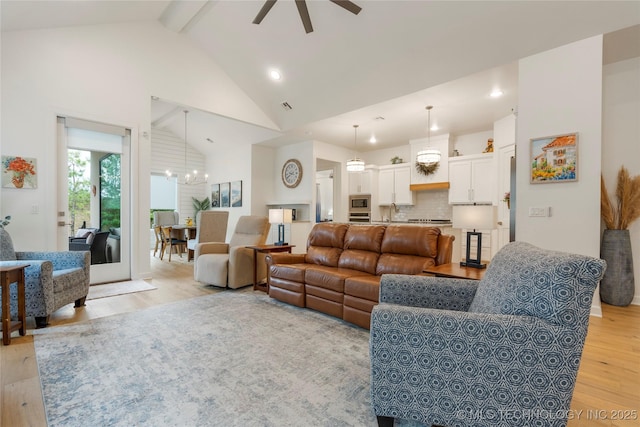 1228 W 85th Ct S, Tulsa, OK 74132 - living room with light wood-type flooring, ceiling fan, a chandelier, beamed ceiling, and high vaulted ceiling