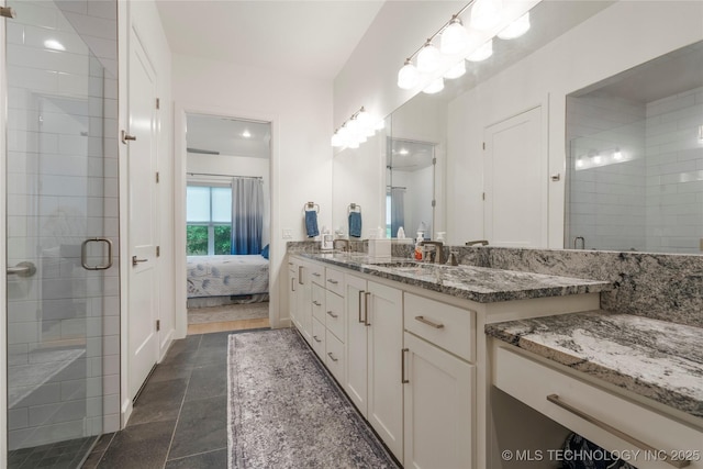 1228 W 85th Ct S, Tulsa, OK 74132 - full bath featuring double vanity, a stall shower, and ensuite bath