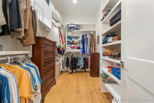 1228 W 85th Ct S, Tulsa, OK 74132 - spacious closet with wood-type flooring