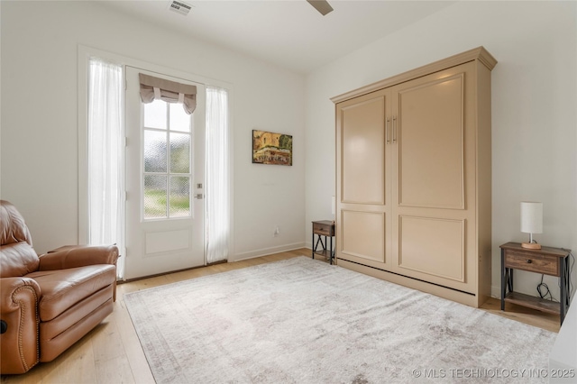 1228 W 85th Ct S, Tulsa, OK 74132 - living area with light wood-type flooring and ceiling fan