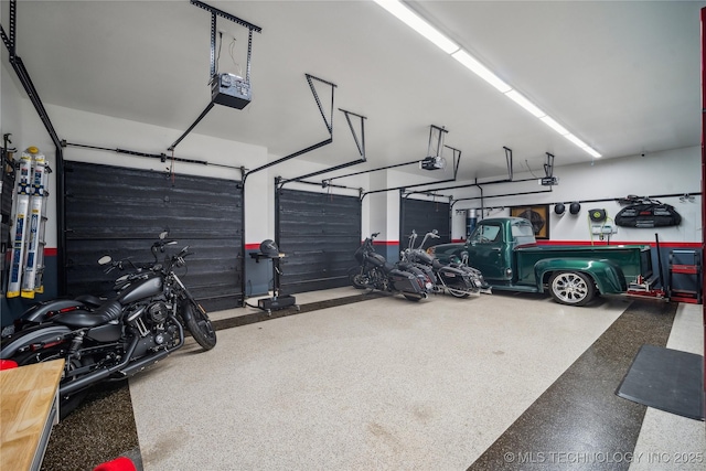 6317 E 110th St, Tulsa, OK 74137 - garage featuring a garage door opener