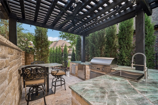 6317 E 110th St, Tulsa, OK 74137 - view of patio / terrace with outdoor dining area, a pergola, and a sink