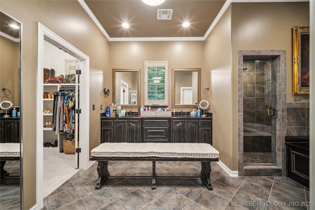 6317 E 110th St, Tulsa, OK 74137 - full bathroom with a shower stall, vanity, crown molding, a spacious closet, and baseboards