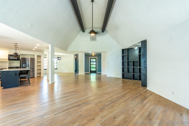 3017 E 88th St, Tulsa, OK 74137 - unfurnished living room with light wood-style flooring, beamed ceiling, baseboards, high vaulted ceiling, and ceiling fan