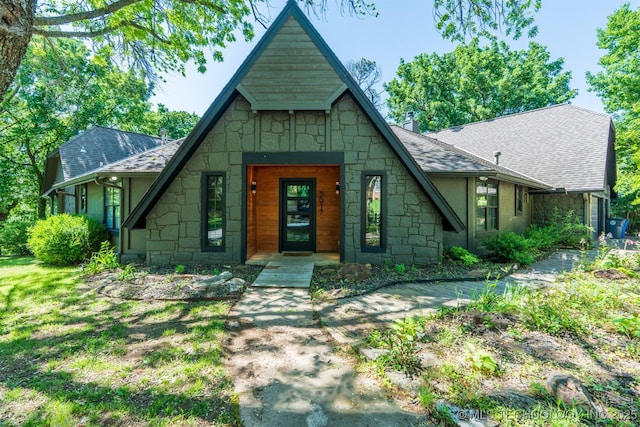 3017 E 88th St, Tulsa, OK 74137 - view of front of house featuring stone siding and a shingled roof