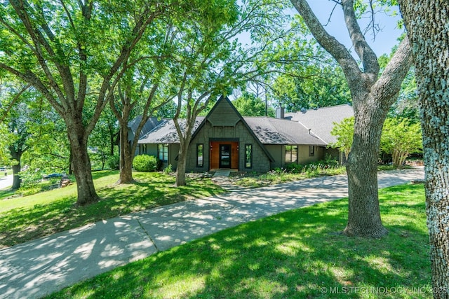 3017 E 88th St, Tulsa, OK 74137 - a-frame home with a front yard and roof with shingles