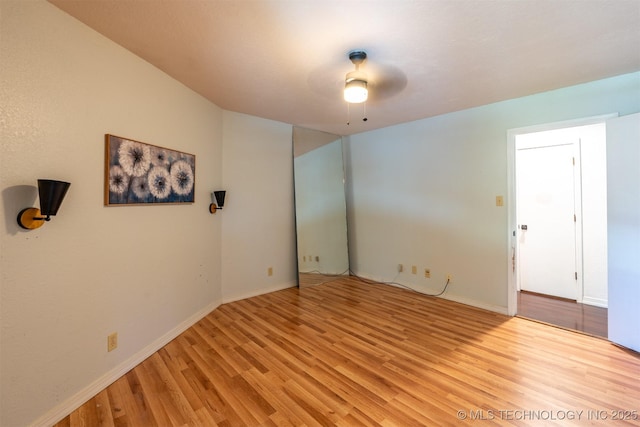3017 E 88th St, Tulsa, OK 74137 - unfurnished room with wood finished floors, a ceiling fan, and baseboards