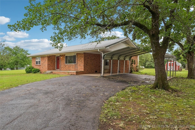 405 Dom Giaudrone, Mcalester, OK 74501 - ranch-style house with driveway, a front lawn, brick siding, a carport, and metal roof